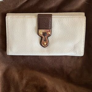 Michael Kors wallet. Very soft leather. Ivory and dark brown. Lightly used.